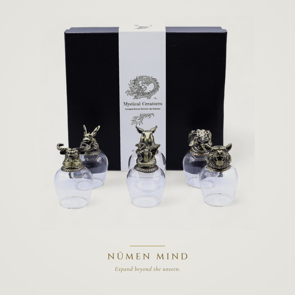 Copas con animales míticos en bronce · NŪMEN MIND