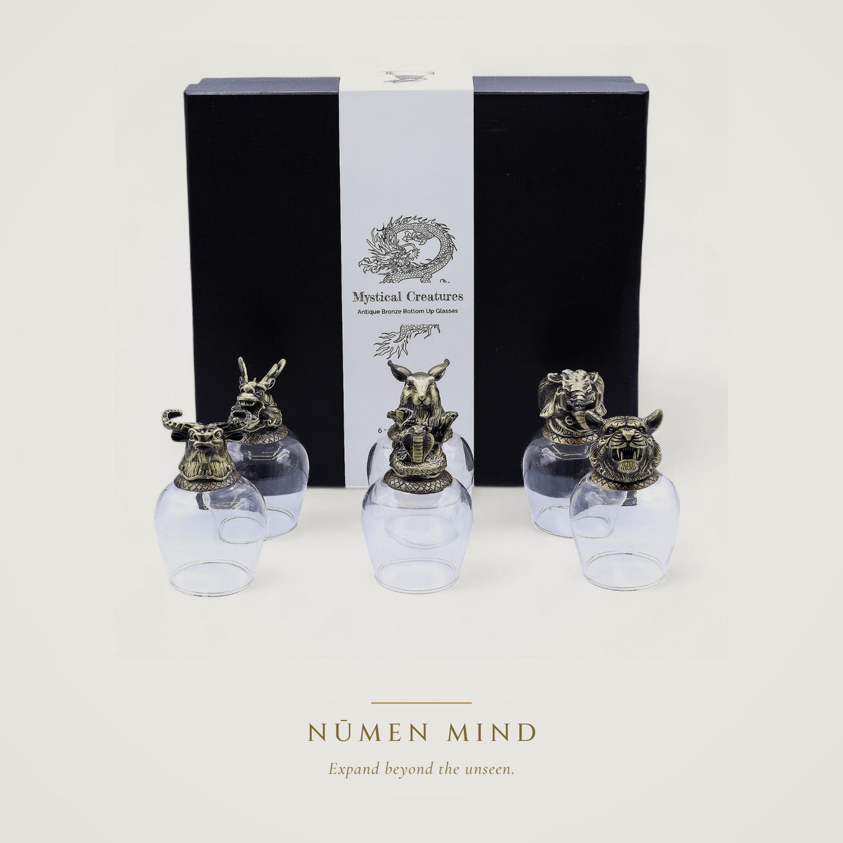 Copas con animales míticos en bronce · NŪMEN MIND