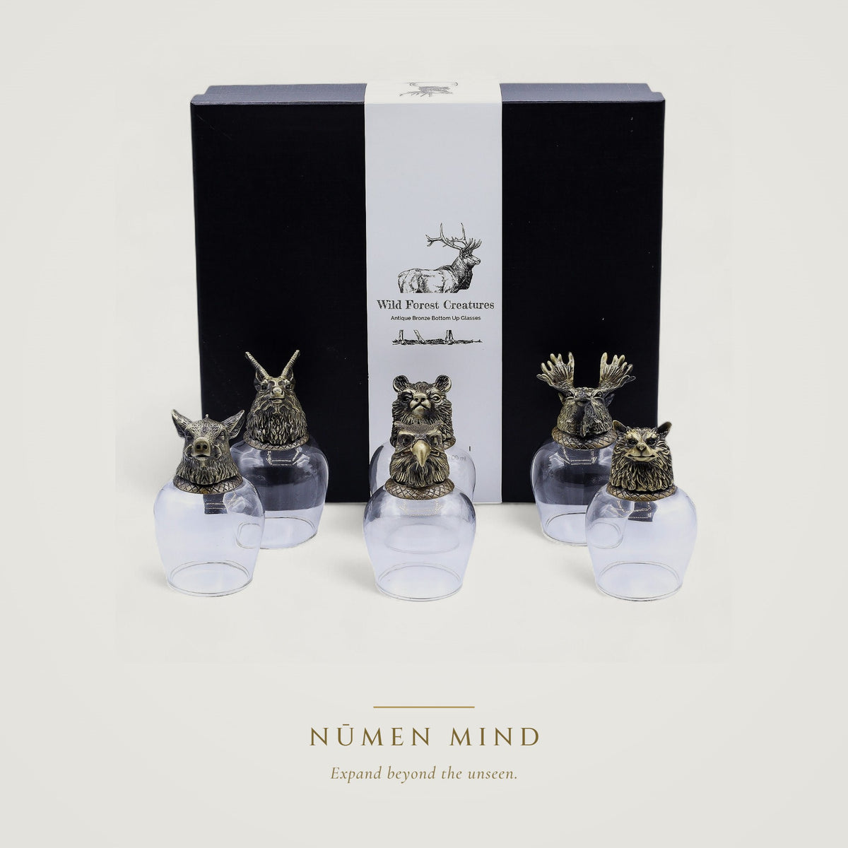 Copas con criaturas del bosque en bronce · NŪMEN MIND